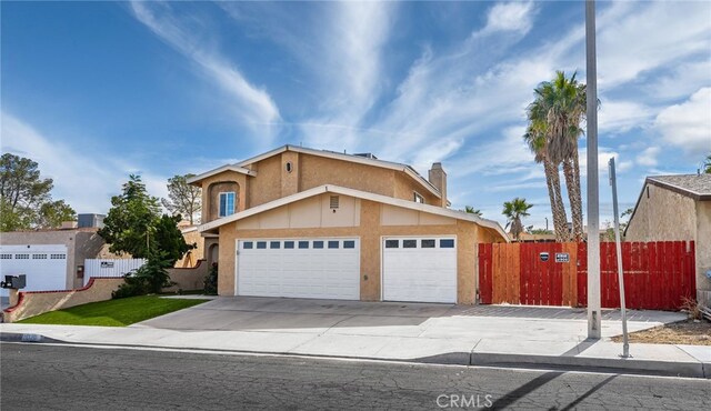 view of front of property with a garage