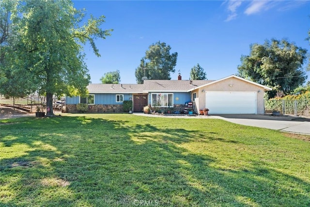 ranch-style home with a garage and a front yard