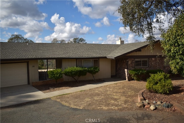 single story home with a garage