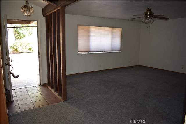 carpeted entryway featuring ceiling fan