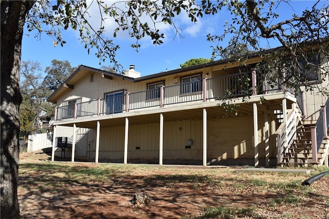 back of property with a deck