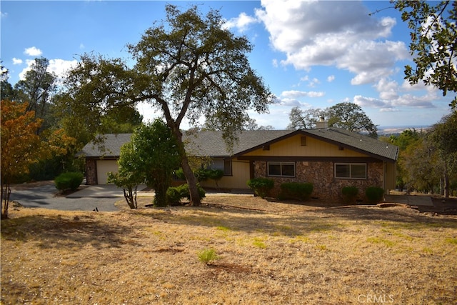 ranch-style home with a garage