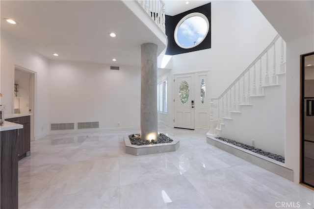 foyer entrance with ornate columns