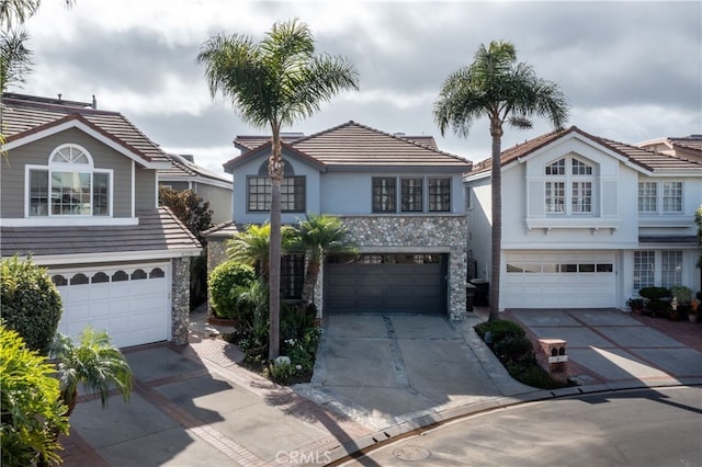 view of front of property with a garage