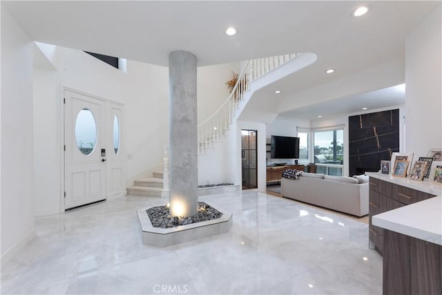 6218 Tobruk Ct, Long Beach, CA 90803 - entrance foyer featuring stairway, light marble finish flooring, recessed lighting, and baseboards