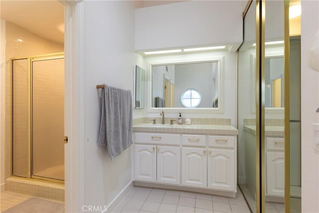 6218 Tobruk Ct, Long Beach, CA 90803 - full bathroom with tile patterned flooring, a stall shower, vanity, and baseboards