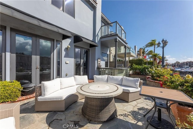 6218 Tobruk Ct, Long Beach, CA 90803 - view of patio with french doors, outdoor lounge area, and a balcony