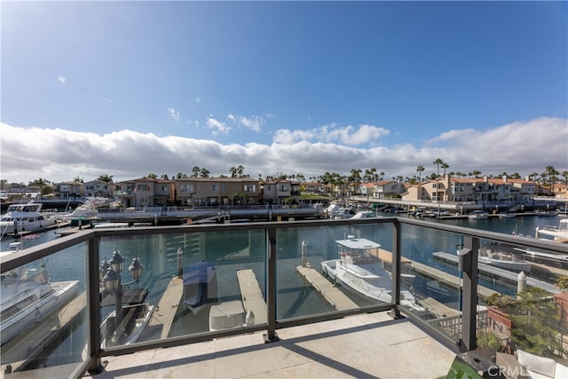 view of pool with a water view