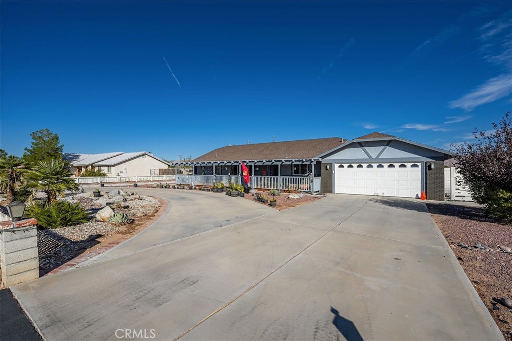 single story home featuring a garage