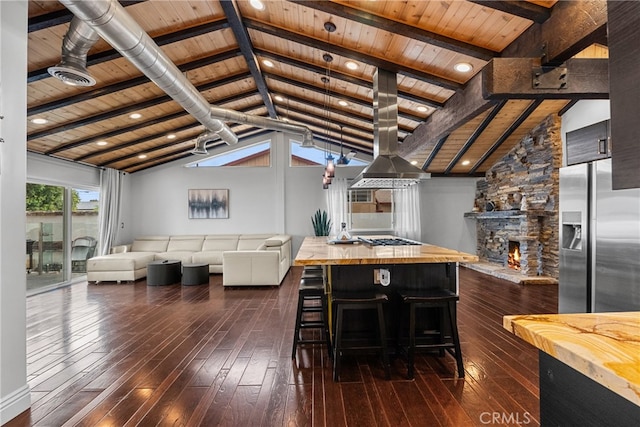 interior space featuring wood ceiling, stainless steel appliances, and dark hardwood / wood-style floors