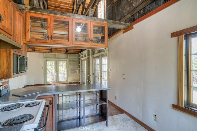 kitchen with french doors and white range with electric stovetop