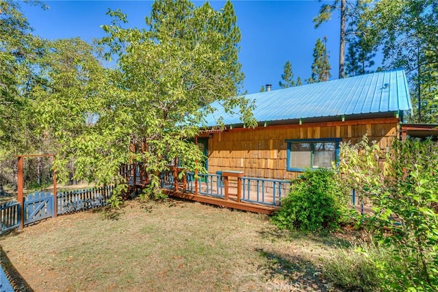 view of yard with a wooden deck