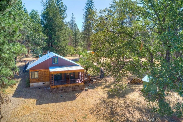 back of property featuring a porch