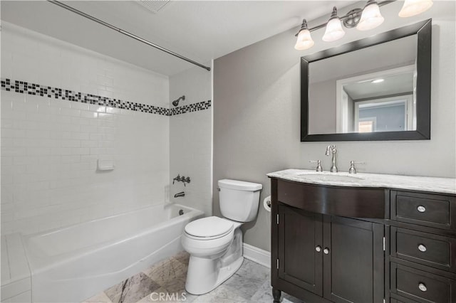 full bathroom with vanity, tiled shower / bath combo, and toilet