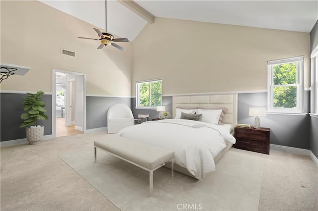 bedroom with ceiling fan, beam ceiling, light carpet, and high vaulted ceiling