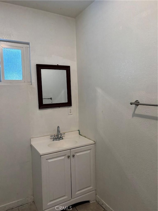 bathroom featuring vanity and tile patterned floors