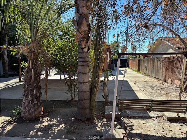 view of side of home featuring a patio