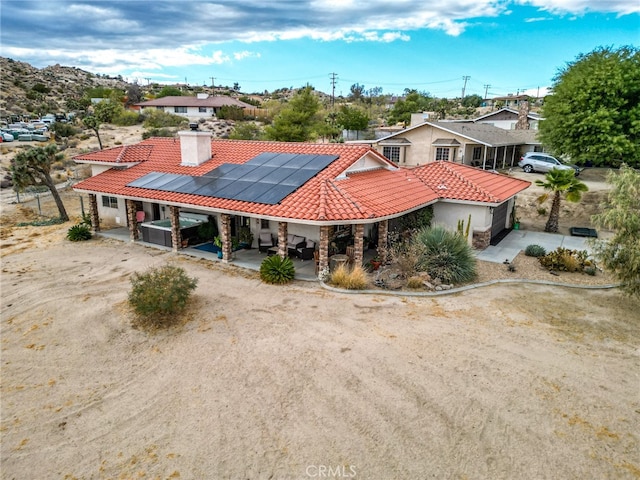 exterior space featuring solar panels