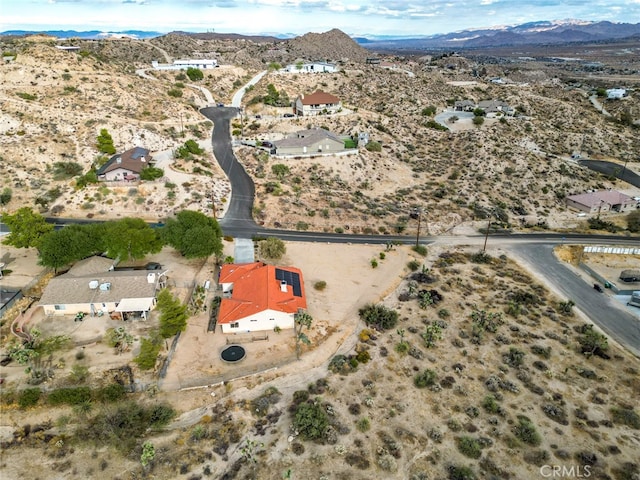 bird's eye view with a mountain view