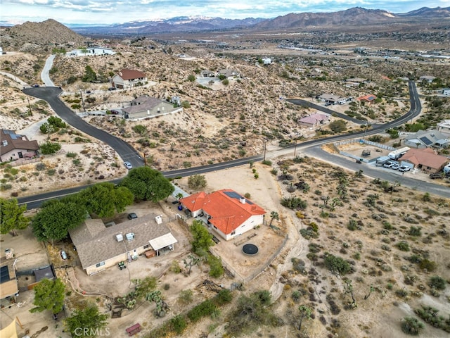 drone / aerial view featuring a mountain view