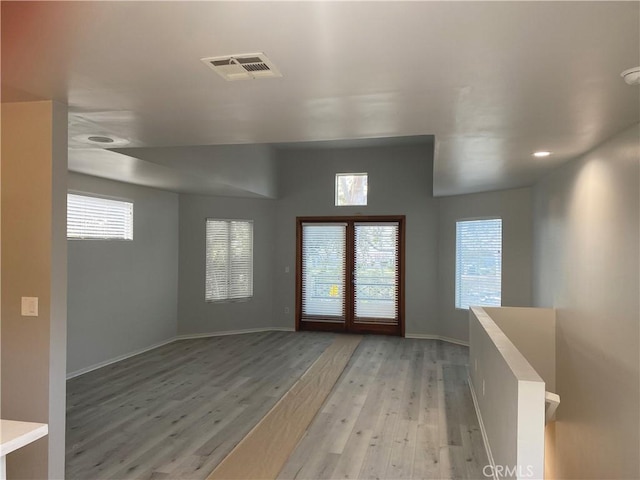 entrance foyer with a healthy amount of sunlight and light wood-type flooring