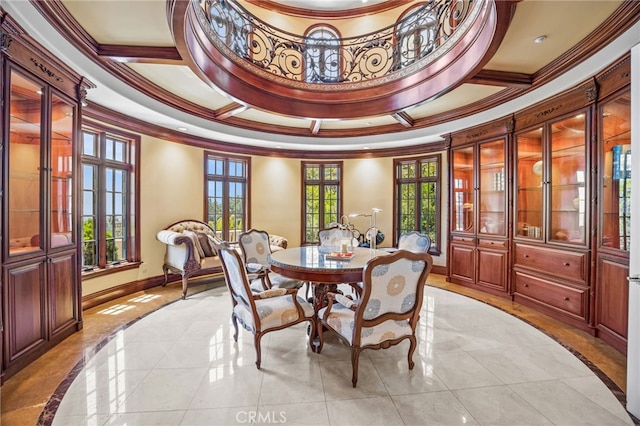 dining room with french doors, crown molding, and light tile patterned floors