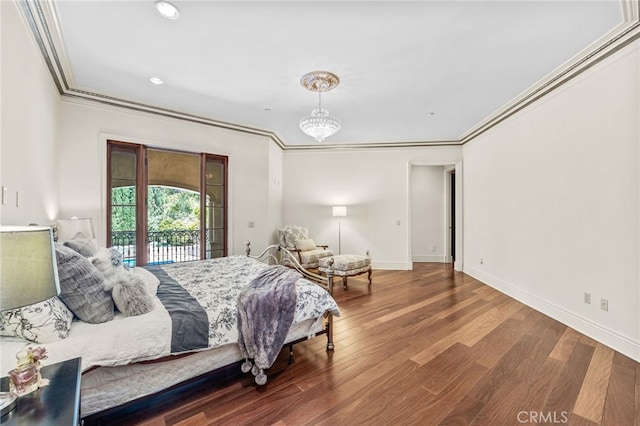 bedroom with a chandelier, crown molding, hardwood / wood-style flooring, and access to outside