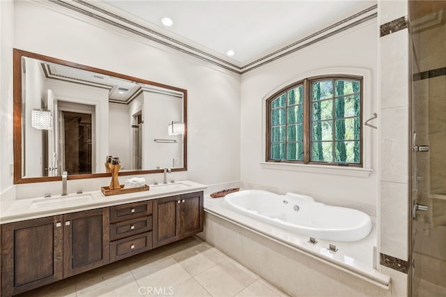 bathroom featuring vanity, ornamental molding, independent shower and bath, and tile patterned floors