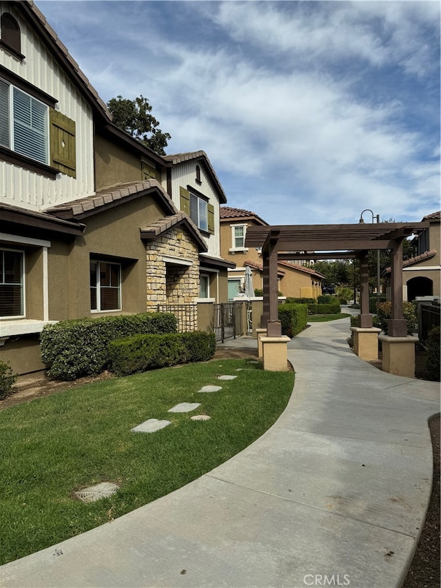 surrounding community featuring a yard