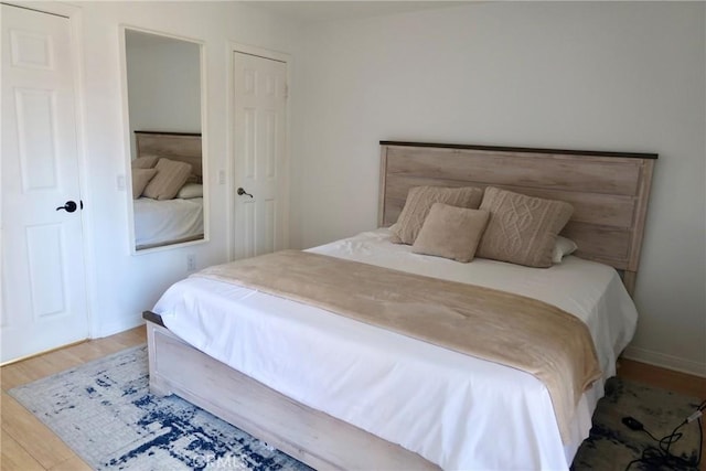 bedroom featuring light wood-type flooring