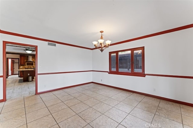 empty room with a notable chandelier and ornamental molding