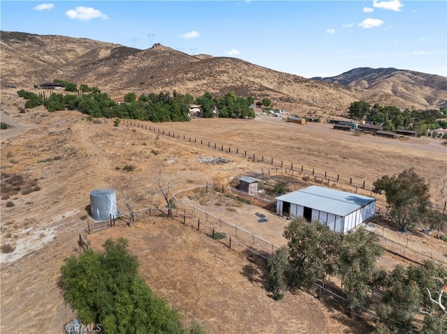 bird's eye view with a mountain view and a rural view