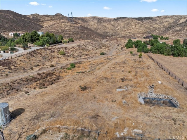 property view of mountains featuring a rural view