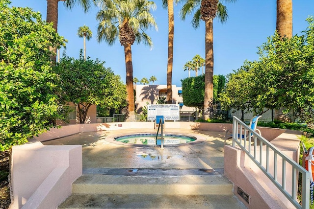 view of pool featuring a hot tub