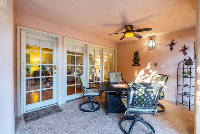 view of patio / terrace featuring ceiling fan