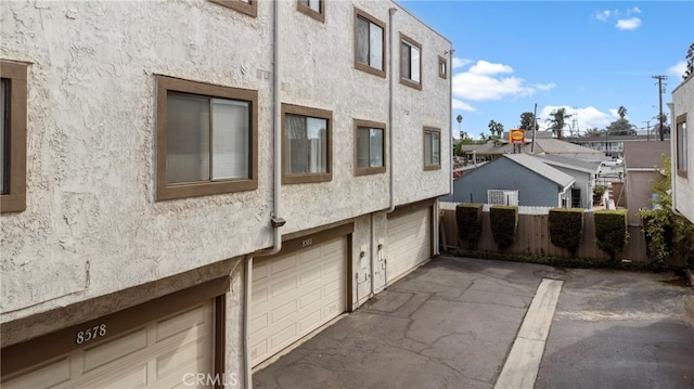 view of home's exterior with a garage