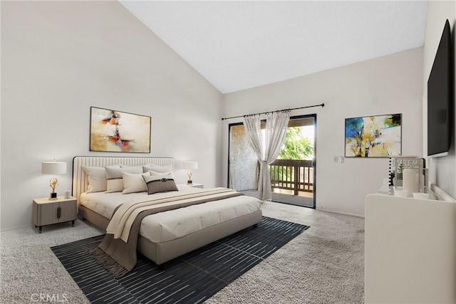 carpeted bedroom featuring access to exterior and high vaulted ceiling