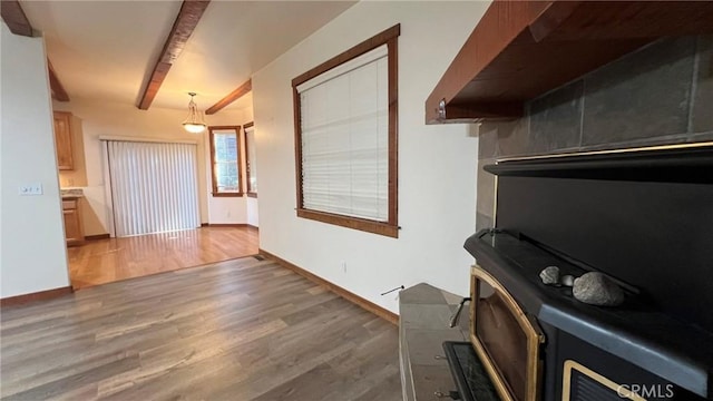 24861 Finhaut Dr, Crestline, CA 92325 - interior space with beam ceiling, wood finished floors, and hanging light fixtures