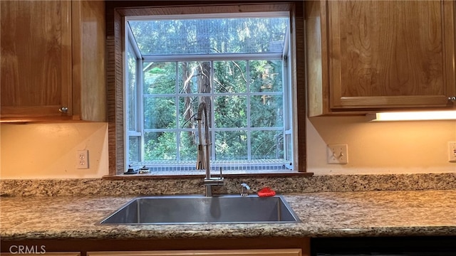 kitchen with sink and dishwasher