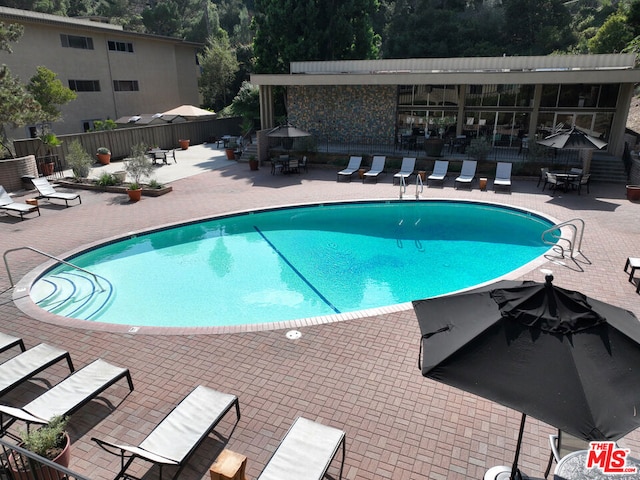 view of pool with a patio