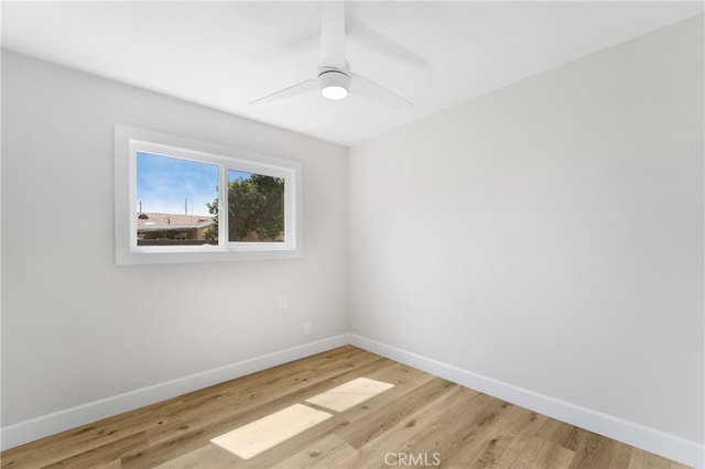 unfurnished room with light hardwood / wood-style floors