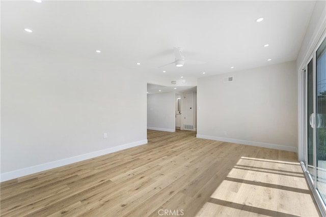 unfurnished room with light hardwood / wood-style floors and ceiling fan