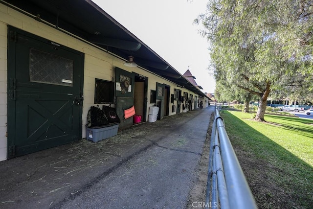 view of home's exterior with a yard