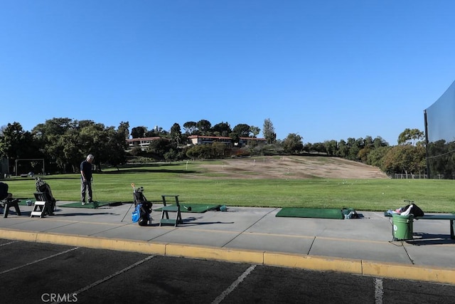 view of home's community featuring a yard