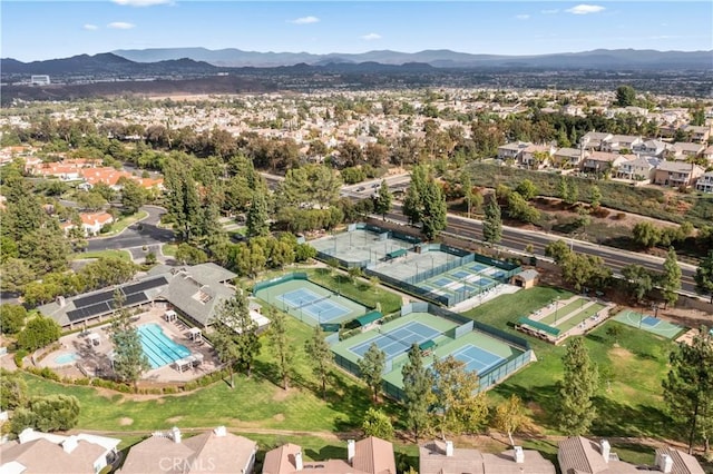 birds eye view of property featuring a mountain view