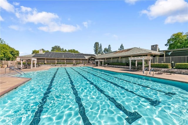 view of pool featuring a patio