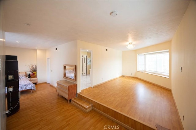 spare room featuring hardwood / wood-style floors