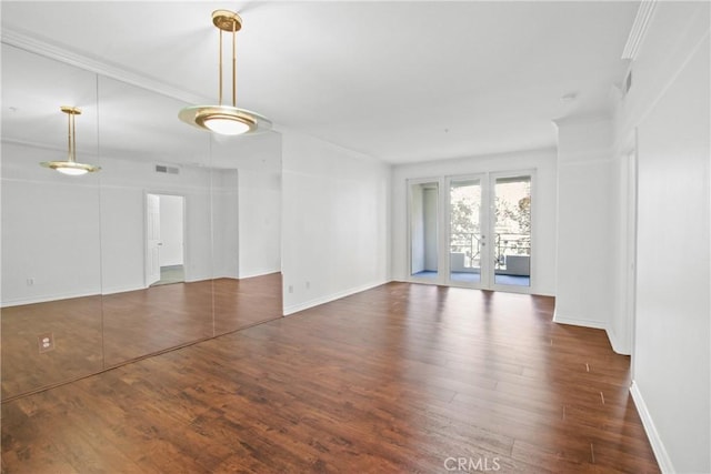 unfurnished room with dark hardwood / wood-style floors