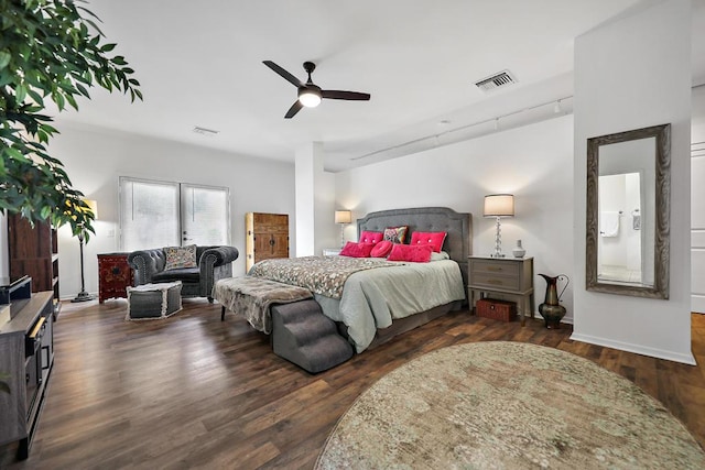 bedroom with ceiling fan and dark wood-type flooring