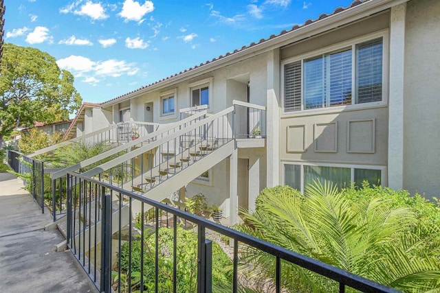 view of property's community featuring stairway